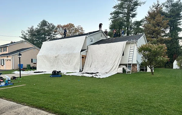 Small home undergoing a roof replacement