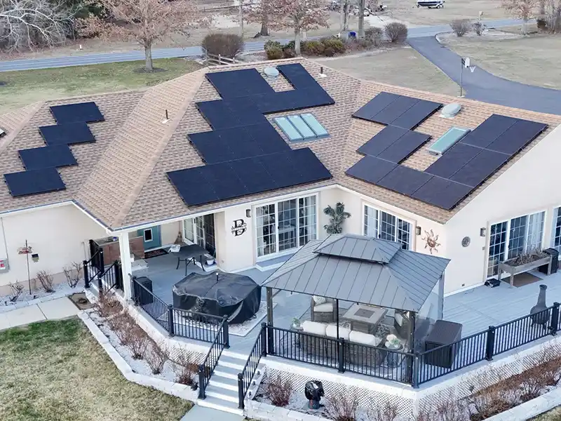 Large home with solar panels on roof
